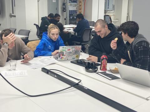 ideathon participants brainstorming around a table